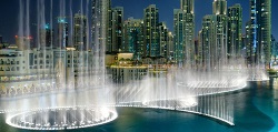 the Dubai Fountain puts on spectacular water shows both day and night and is located close to the Burj Khalifa
