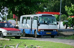 take a bus or taxi to navigate Libreville